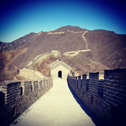 View of arch bridge against clear sky