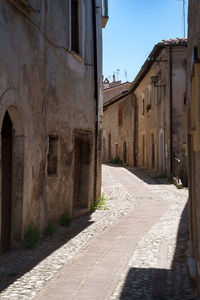 Alley amidst buildings in town