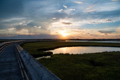 Scenic view of sunset over lake