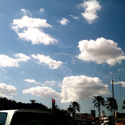 Low angle view of road against cloudy sky