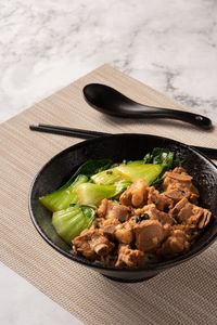 High angle view of meat in plate on table