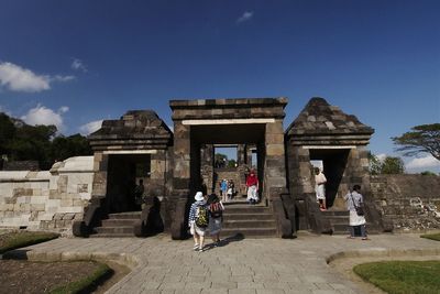 Tourists in front of historic building