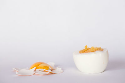 Close-up of cake against white background