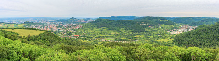 Scenic view of landscape and mountains against sky