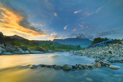 Scenic view of sea against sky at sunset