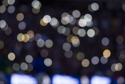 Defocused image of illuminated lights at night