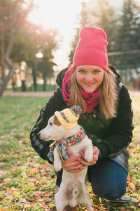 Portrait of cute girl with dog