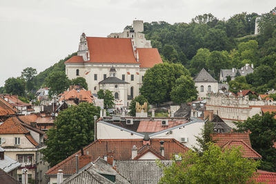 High angle view of residential buildings against sky