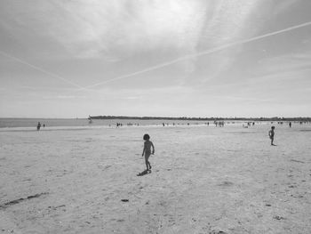 Woman standing on beach