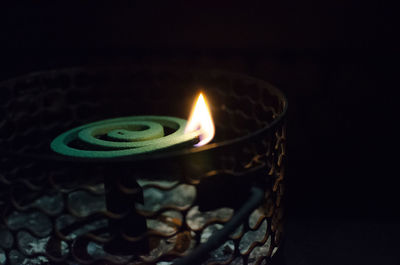 Close-up of burning candle