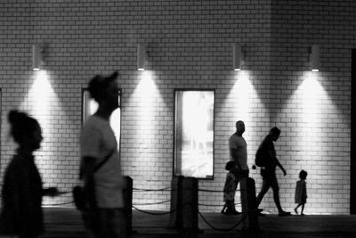 Group of people walking on zebra crossing