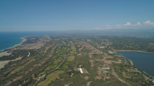 Aerial view of beautiful beach, lagoons and paoay lake. philippines, luzon, ilocos norte. 