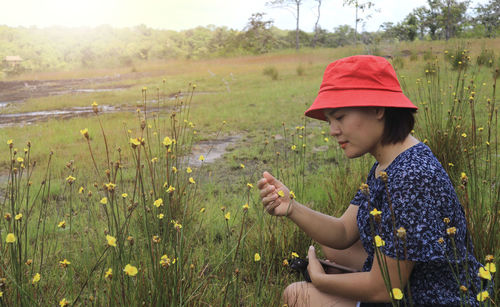 Side view of woman on land