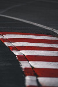 Close-up red and white kerb formula 1 track