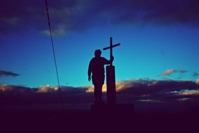 Silhouette people standing on landscape