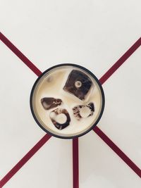 High angle view of coffee on glass
