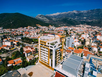 High angle view of townscape against blue sky