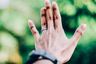 Close-up of hands against blurred background