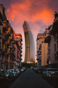 View of city street during sunset