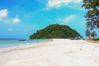 Scenic view of beach against sky