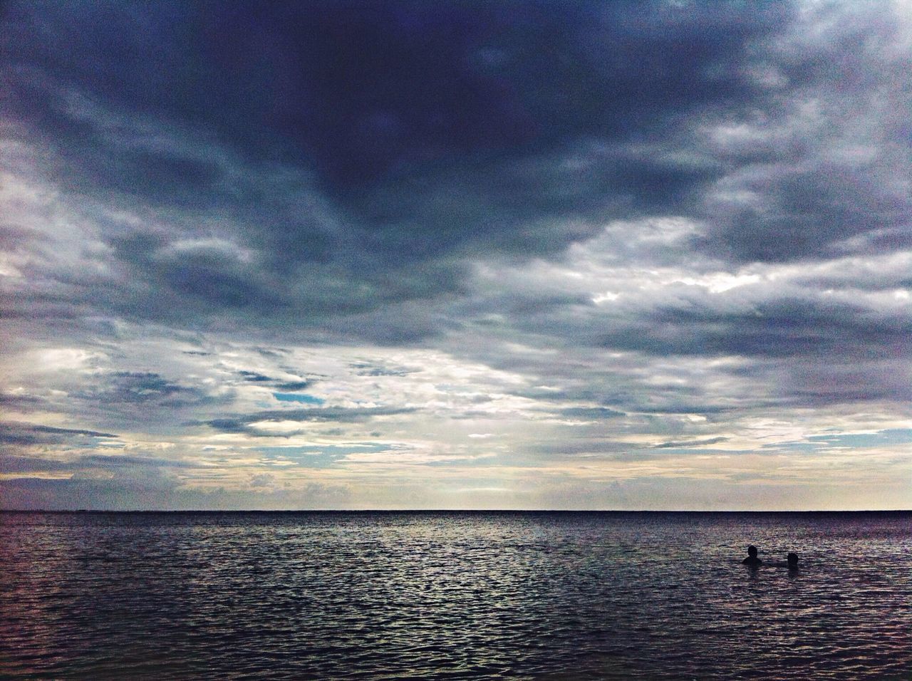 sea, horizon over water, water, sky, tranquil scene, scenics, tranquility, waterfront, cloud - sky, beauty in nature, cloudy, nature, cloud, seascape, idyllic, overcast, weather, dusk, rippled, calm