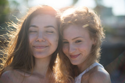 Close-up of smiling female friends