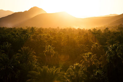 Scenic view of mountains against sky during sunset