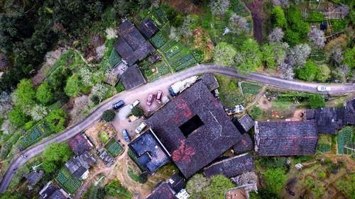 High angle view of abandoned car on land