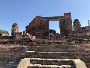 Low angle view of old ruin against clear sky