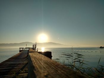 Pier on sea against sky