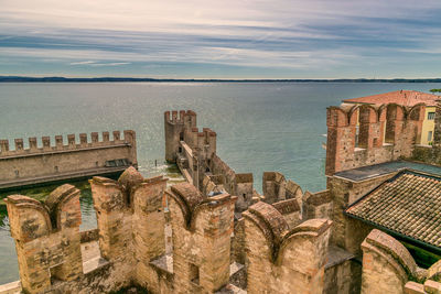 Panoramic view of sea against sky in city