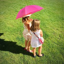 Full length of girl playing in park