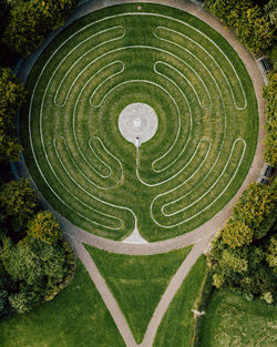 High angle, drone view of one person in maze