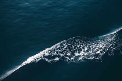 High angle view of wake in sea