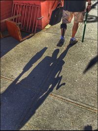 Shadow of woman standing on floor