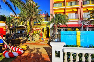 Street and multi colored buildings in city