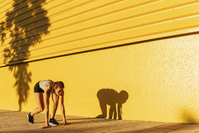 Shadow of man walking on wall