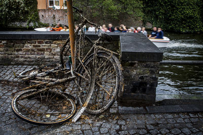 Abandoned bicycles by retaining wall