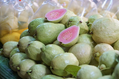 Fresh pink guava fruits in market for sale