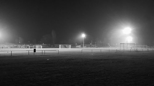 Illuminated street light at night