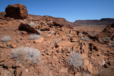 Rock formation on land against sky