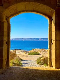 Scenic view of sea against clear blue sky