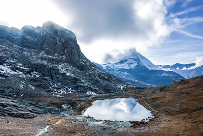 Panoramic view of matterhorn peak, switzerland. matterhorn reflection in the riffelsee.