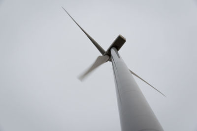 Low angle view of windmill against clear sky