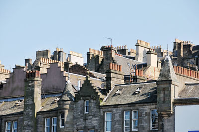 Photo of some chimneys in traditional english style