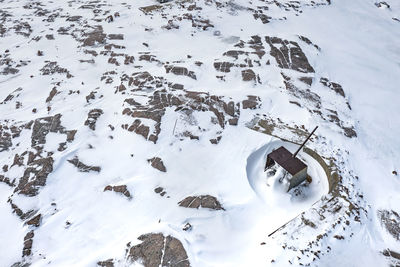 High angle view of snow covered field