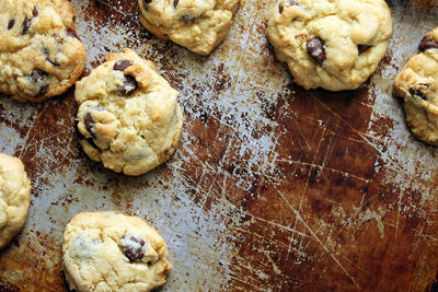 High angle view of cookies arranged on rusty tray