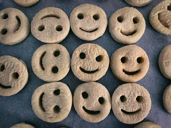 Directly above shot of white candies against blue background