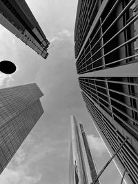 Low angle view of skyscrapers against sky