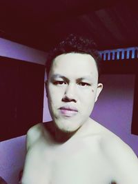 Portrait of man at home